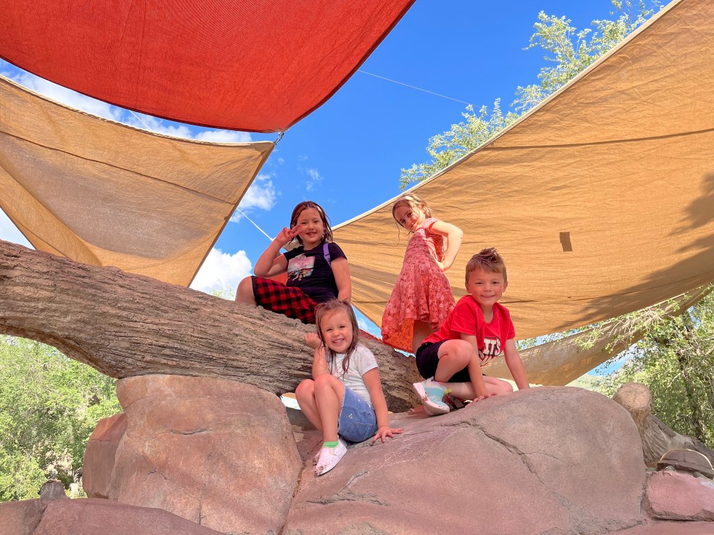 Woman writing about healing from grief and emotional burnout after death of husband. (pictured: daughters and cousins)