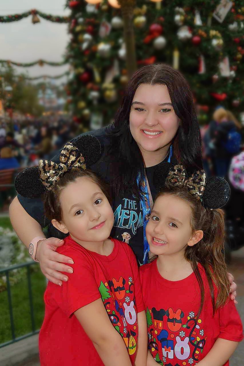 Woman writing about healing from grief and emotional burnout after death of husband. (Pictured: daughters of late husband)