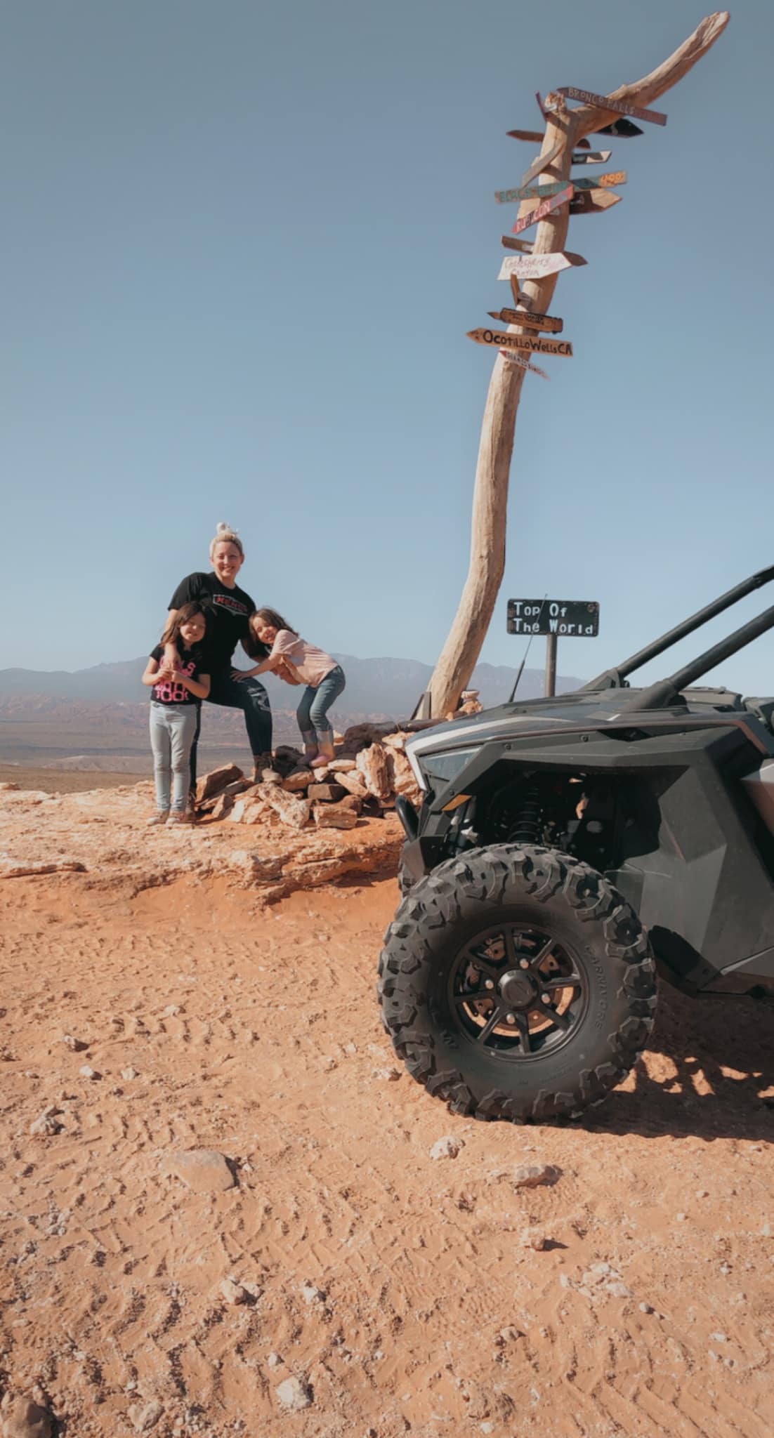 Woman writing about healing from grief and emotional burnout after death of husband. (pictured: on top of the world off-road)