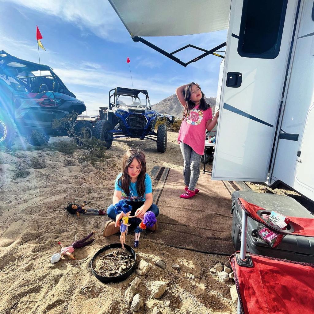 Woman writing about healing from grief and emotional burnout after death of husband. (pictured: daughters of late husband)