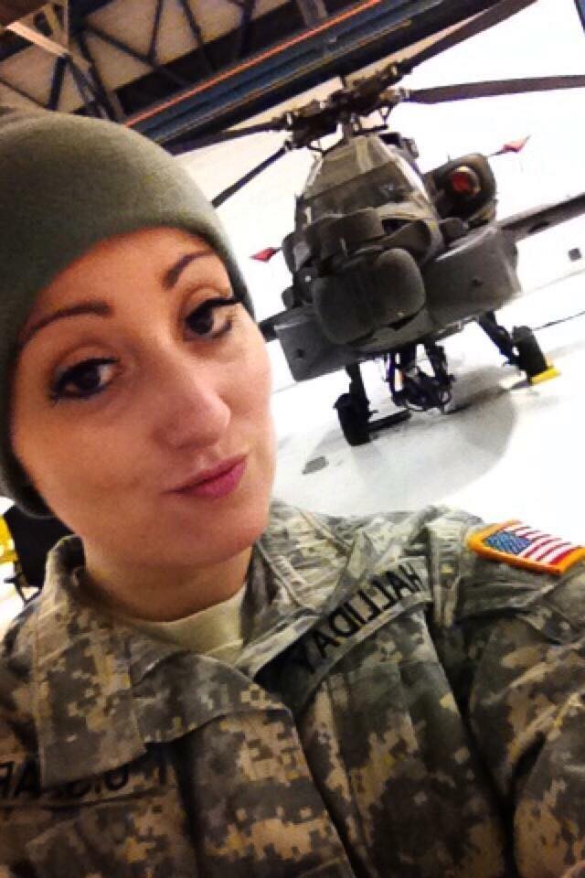 Woman writing about healing from grief and emotional burnout after death of husband. (pictured: veteran)